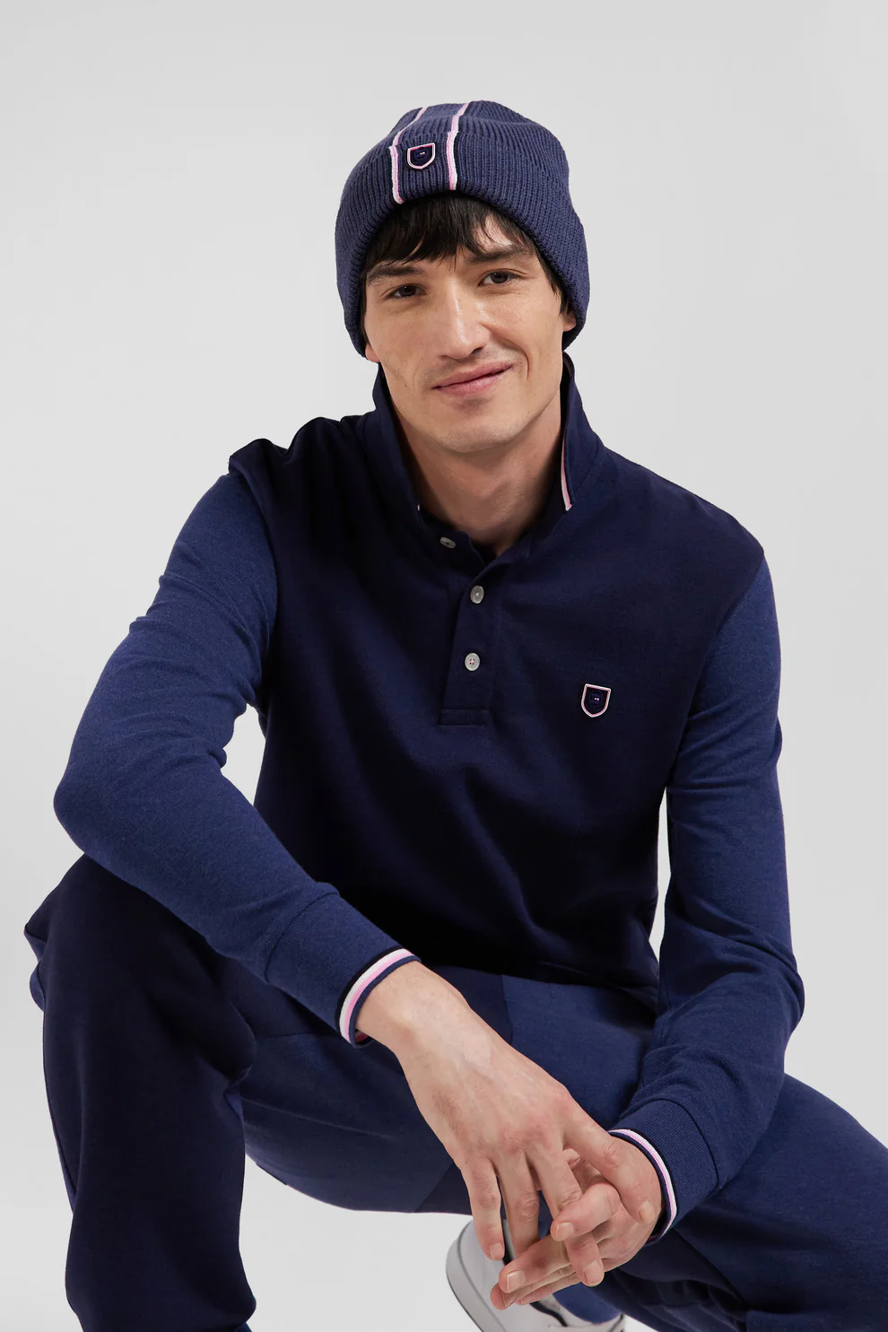 Featured image for “Polo manches longues en piqué coton bleu marine col jacquard écusson gomme coupe Regular Eden Park”