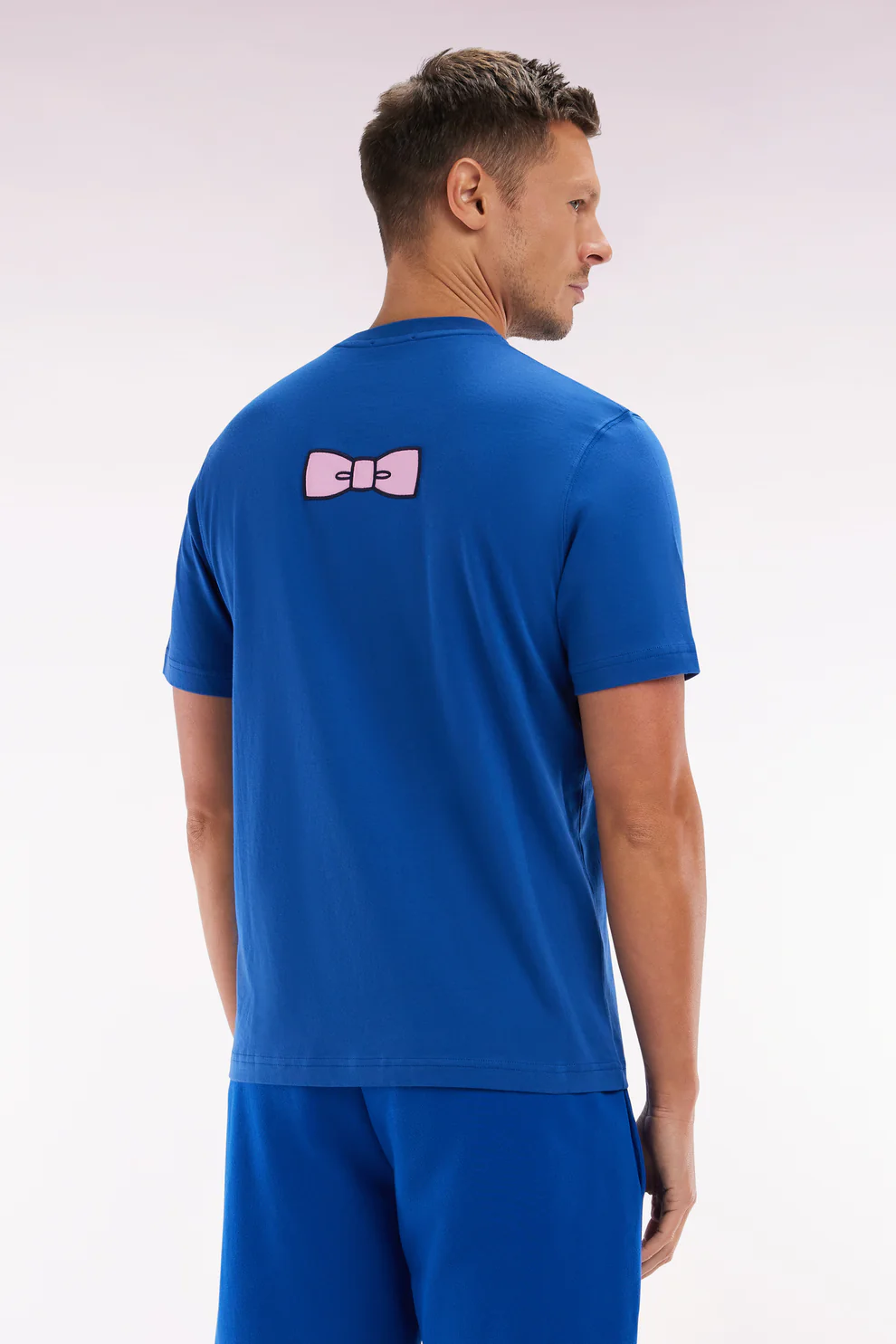 Featured image for “T-shirt en coton Pima bleu foncé broderie dos coupe droite Eden Park”