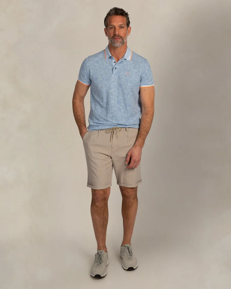 Featured image for “Polo bleu clair à imprimé Nza”