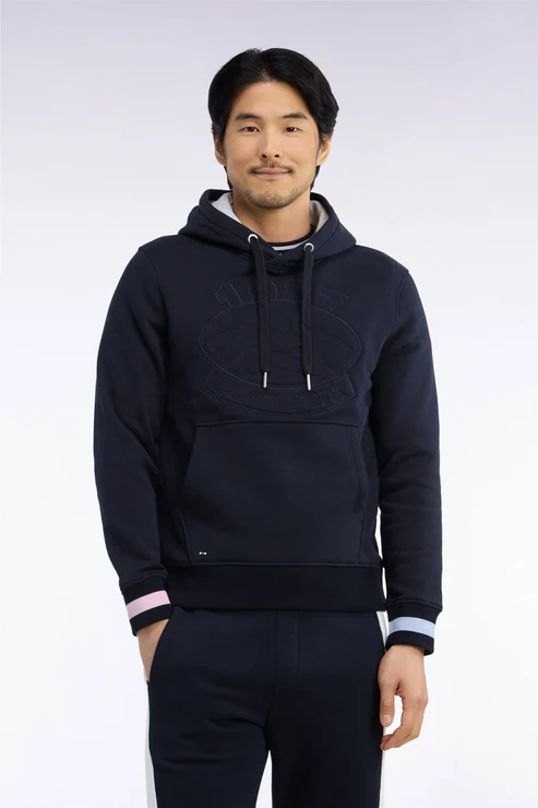Featured image for “Sweat à capuche en polaire de coton bleu marine brodé coupe droite Eden Park”